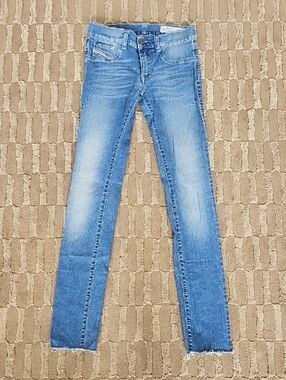 Diesel Blue Light-Wash Jeans with Gold Zipper Detail